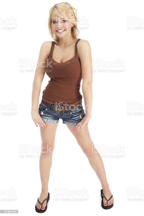Attractive Casual Young Woman In Brown Tank Top And Shorts