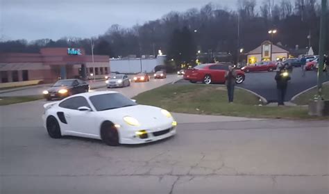 Porsche 911 Turbo Nearly Crashes While Leaving Car Meet Driver Saves