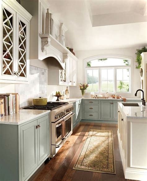 Most often, this is done with the top cabinets in one color and the bottom in another, likely darker, hue. 7 Trends Two Tone Kitchen Cabinets Ideas for 2018 Two tone kitchen cabinets ideas farmhouse ...