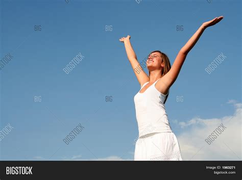Woman Raising Arms Above Her Head Image And Photo Bigstock