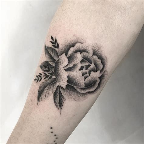 Dot Work Style Black Flower Tattoo On The Right Inner Forearm Black