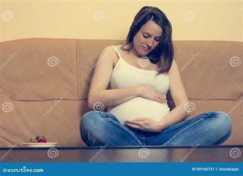 Intimate Portrait Of Young Pregnant Woman Holding Her Belly Stock Image Image Of Lifestyle