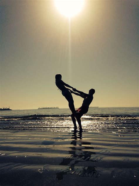 It's beneficial to deepen benefits of two people yoga poses (partner yoga). Couples Yoga on long beach CA! Beautiful day in Cali ...