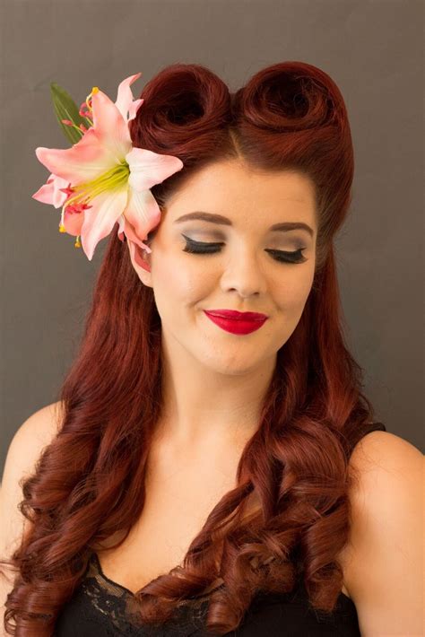 Free tutorial with pictures on how to style a victory roll in under 20 minutes by applying makeup and hairstyling with shampoo, hair slide, and hair spray. Perfect Interlude: Victory Rolls Long Hair