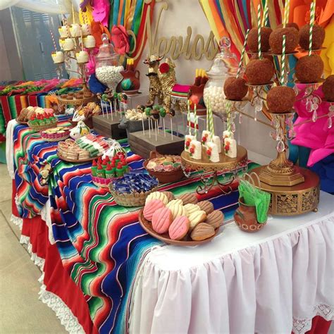 Apart from the colorful food, a south of the border themed table also features bright serapes, sombreros, and piñatas. Fiesta / Mexican Bridal/Wedding Shower Party Ideas | Photo ...