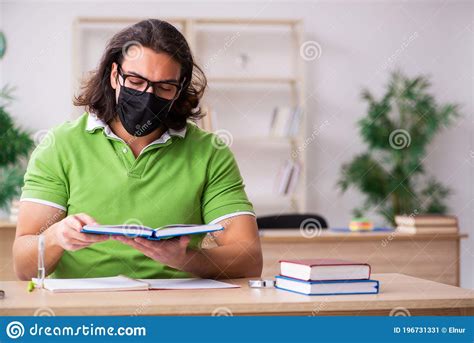Young Man Student Studying At Home In Self Isolation Concept Stock