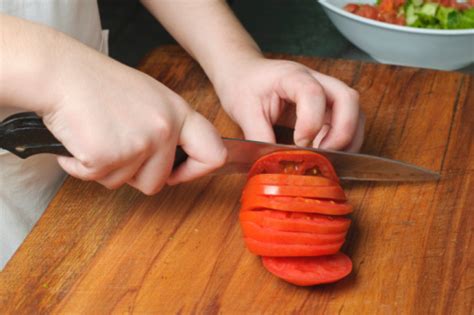 Slicing The Tomato Stock Photo Download Image Now Istock