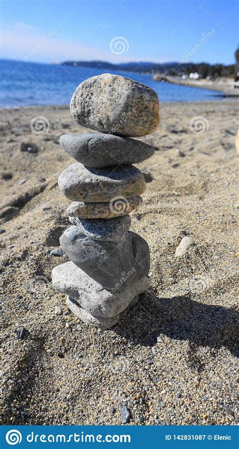 Rock Stacking On The Beautiful Beach Background Stock Image Image Of