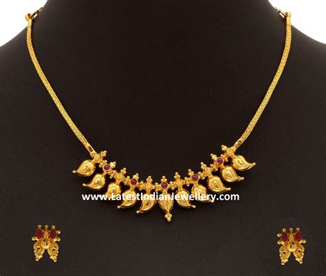 0.99 inches long and 0.67 inches wide finish: Reversible Mango Necklace - Latest Indian Jewellery Designs