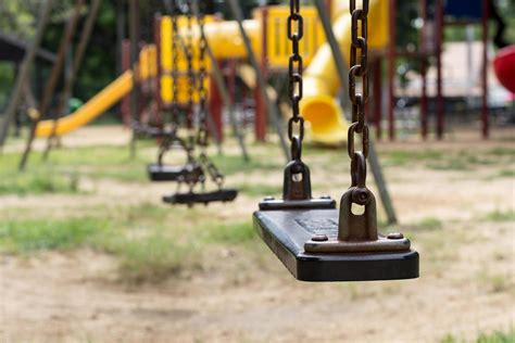 Closeup Of Empty Swings On The Playground 2484965 Stock Photo At Vecteezy