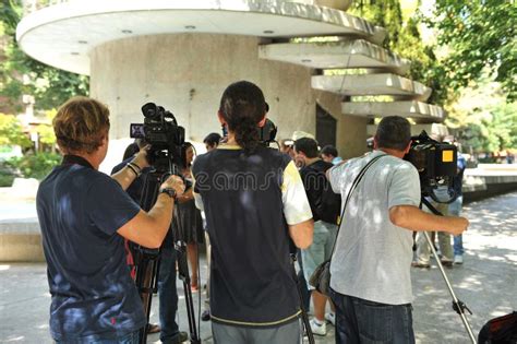 Journalists Taking Pictures With Television Cameras Editorial Image
