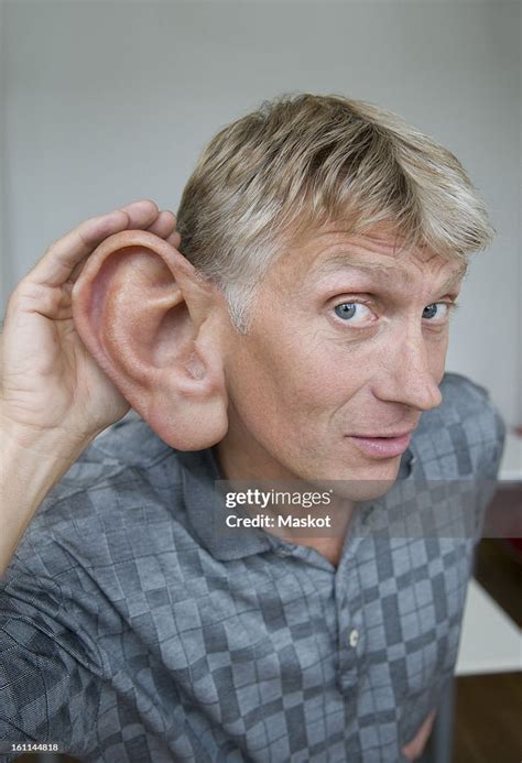 Man With Big Ear High Res Stock Photo Getty Images