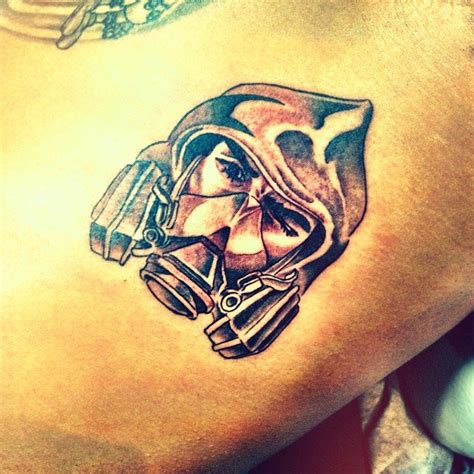 Chris brown loves his tattoos, so it's no surprise that he got another one in honor of his newborn son, aeko. Chris Brown Got New Tattoo of Himself as "The Bandit" Near ...