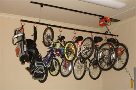 When the ride is over, simply attach your bike and engage the thoughtfully engineered hoist that powerfully lifts your bike while you gently guide it safely toward the ceiling. Bicycle Lifts For Garage / 8 Great Garage Bike Storage ...