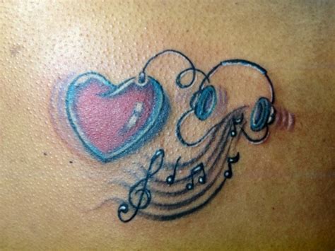 This tattoo shows the bearer's love for music. music tattoos love music - | TattooMagz › Tattoo Designs ...