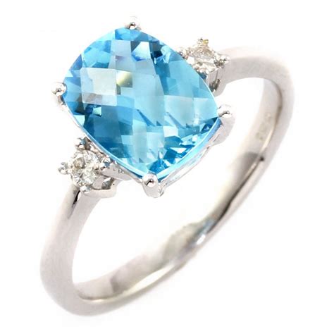18ct White Gold Blue Topaz And Diamond Ring