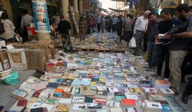 age islam   manuscripts books burnt  isil  iraqs anbar photo