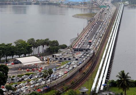 M'sia's vehicle entry permit will be coming into effect on oct. Vehicle entry permit on hold as many S'porean vehicles ...