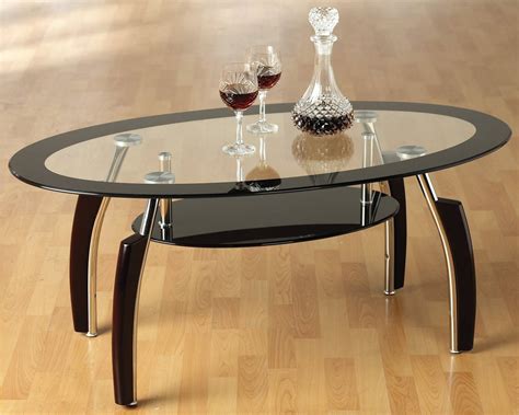 In addition to the design this elegant piece of furniture is also available in an array of shapes. Elena Black and Clear Glass Coffee Table
