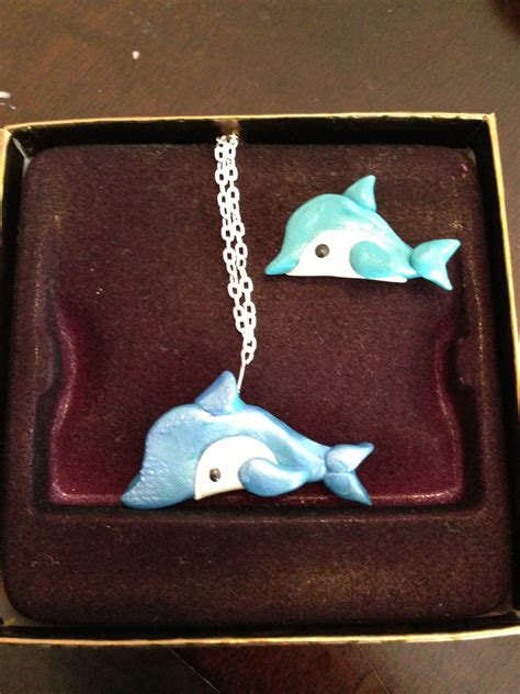 Well you're in luck, because here they come. Dolphin clay charms | Clay charms, Clay figurine