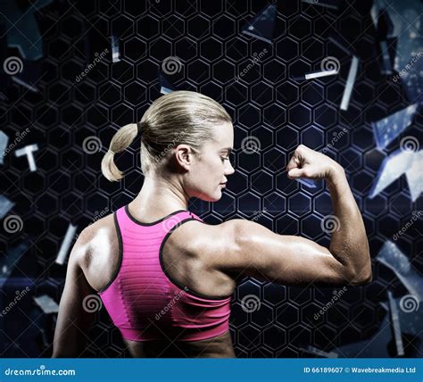 Composite Image Of Muscular Woman Flexing Her Arm Stock Image Image