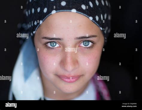 Close Up Of A Young Syrian Refugee Face With Blue Eyes Erbil Stock