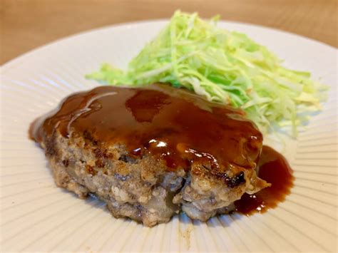 Each order is prepared at your teppanyaki table by your own. Japanese Youshoku plate (Omurice and Tofu hamburger steak ...