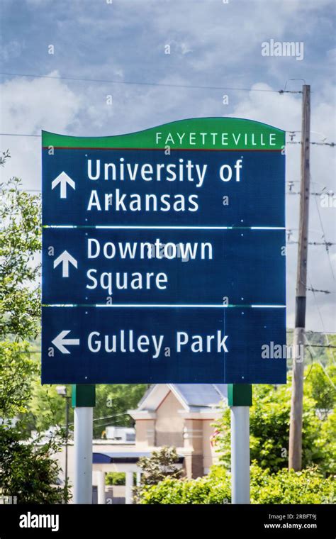 Sign For University Of Arkansas And Downtown Square And Gulley Park