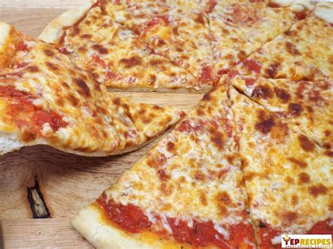 Slide pizza onto baking stone and bake until cheese is melted with some browned spots and crust is golden brown. New York Style Cheese Pizza: A crispy and chewy thin crust ...