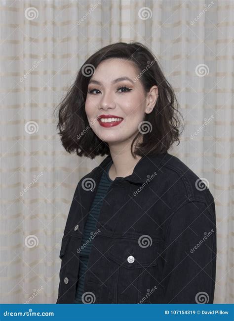 Head Shot Of A Beautiful Twenty Year Old Amerasian Woman Stock Image