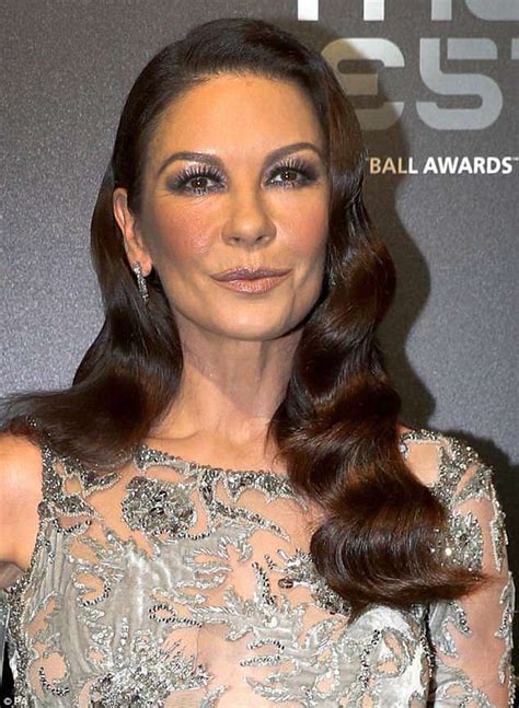 Evening standard via yahoo news· 1 year ago. Catherine Zeta-Jones, 48, shows off taut unlined face at ...