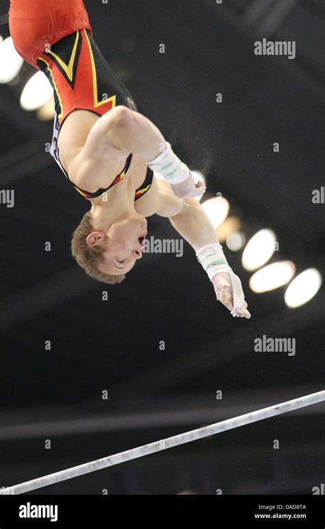 Fabian Hambüchen Of Germany Performs On The Horizontal Bar During The Mens Team Final Of The