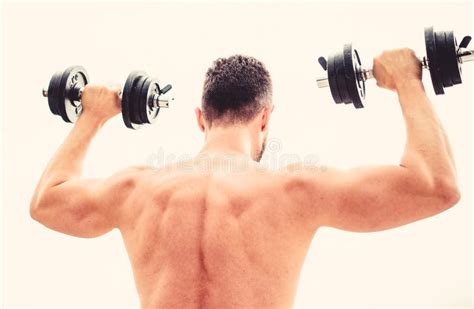 Muscular Man Exercising With Dumbbell Rear View Actions Speak Louder