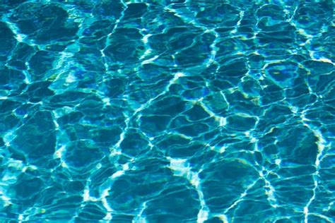 Premium Photo Ripple Water In Swimming Pool With Sun Reflection Wavy Water Background