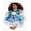 Miniature Porcelain Doll With Blue Dress And Brown Hair  By Ganz