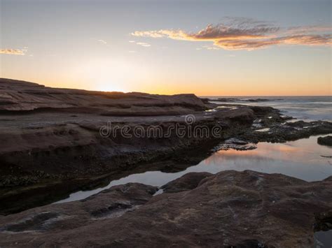 Sunset On Rocky Beach Red Bluff Kalbarri Western Australia Stock