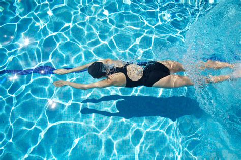 benefits of swimming 10 reasons to take to the water sweat