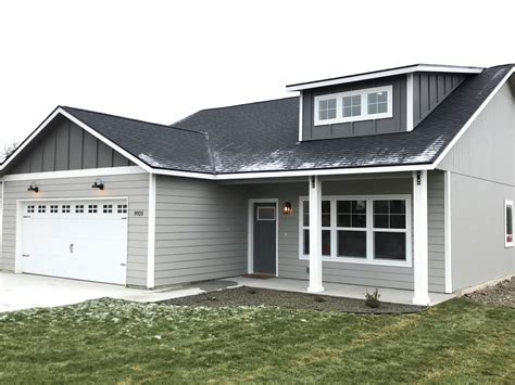 Exterior paint colors Main body SW Dorian Gray Door & board & batten SW