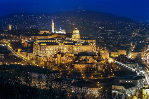 Discover the buda castle with the official budapest castle bus! Matthias Church and Buda Castle view at night, Budapest ...