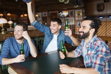 Happy Male Friends Drinking Beer At Bar Or Pub Stock Photo Image Of