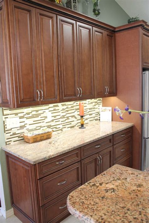 • traditional paneled cabinets give your kitchen a tailored look • cabinets ship next day. Fabuwood Wellington Cinnamon, under cabinet lighting ...