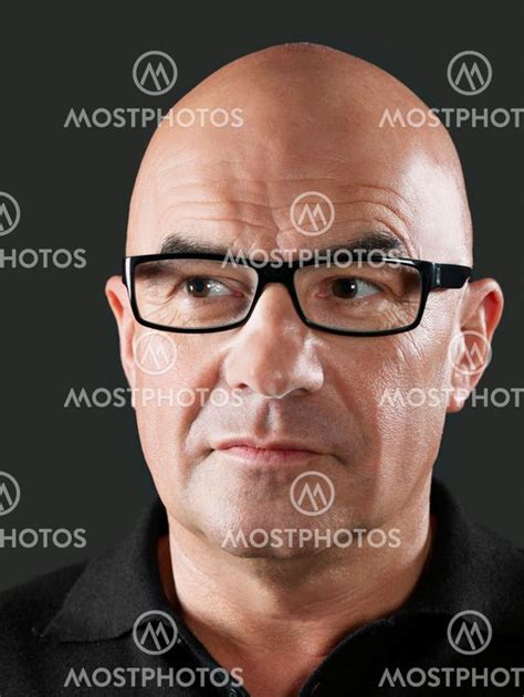 Bald Man Wearing Glasses By Craig Mostphotos
