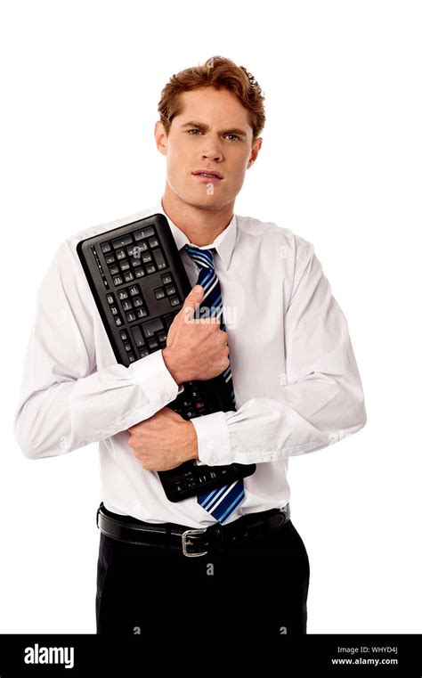 Deppressed Businessman Holding Keyboard Stock Photo Alamy