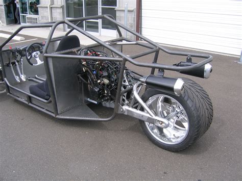 A Motorcycle With A Side Car Attached To It