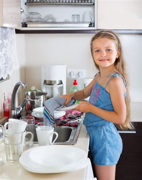 Girl Doing Dishes At Kitchen Stock Image Image Of Holding Portrait