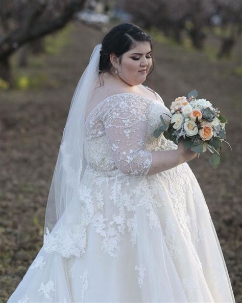 This Long Sleeve Wedding Gown Is A Great Cut For A Larger Full Figured