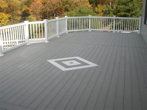 The azek posts are nice and i initially thought i would go with all white railings + balusters just because i love white so much, but. white and gray wood porch | ... gray white azek decking ...