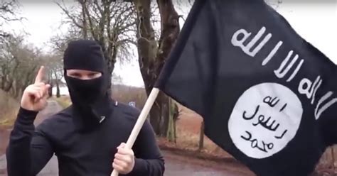 Security Alert In Germany As Masked Man With Isis Flag And Gun Crosses