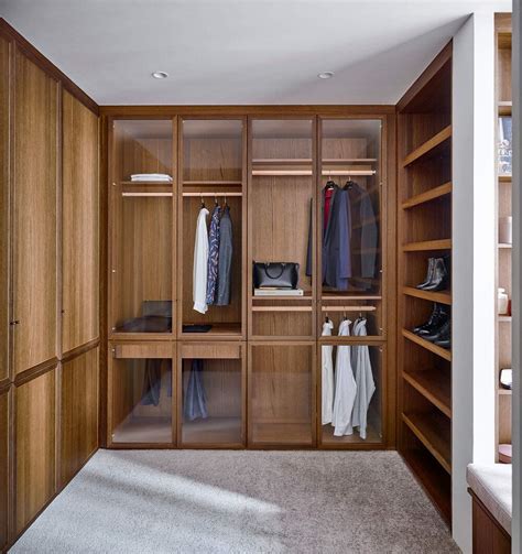 Wooden Joinery Combined With Some Clear Glass Doors Is A Nice Idea This Walk In Robe Features