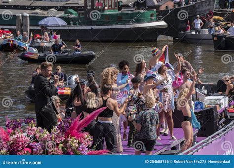 pride amsterdam ambassadeurs boat at the gaypride canal parade with boats at amsterdam the